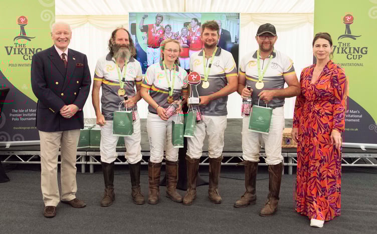 The Locate IoM team that triumphed in last weekend's Viking Cup polo tournament at Ballacooiley Equestrian Estate in Ballaugh, pictured alongside Lieutenant Governor Sir John Lorimer and Ramsey Crookall chief executive officer Joanna Crookall